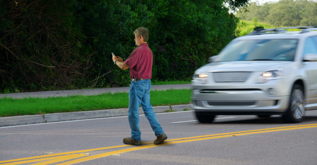 Pedestrian jaywalking got hit by car.