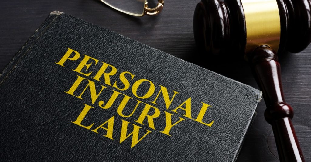 Personal injury law book in the table.