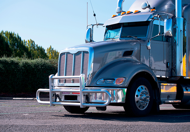tractor trailer in a parking lot