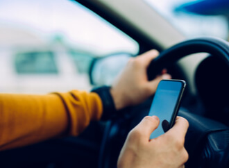 driver using their cellphone while driving