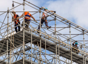 construction workers on scaffolding