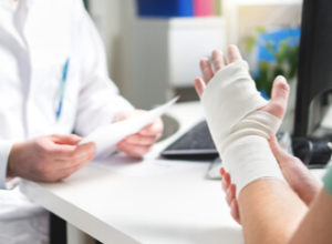 injured person consulting with their doctor