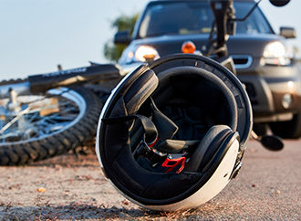 Motorcycle helmet lying on the road after an Indiana motorcycle accident