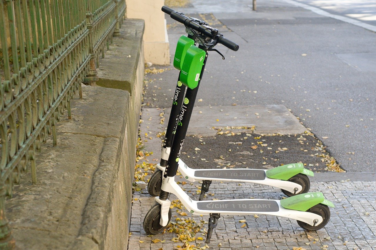 Lime scooters parked near the street