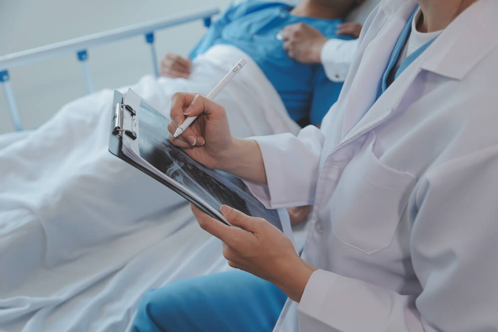 Doctor checking patients condition.