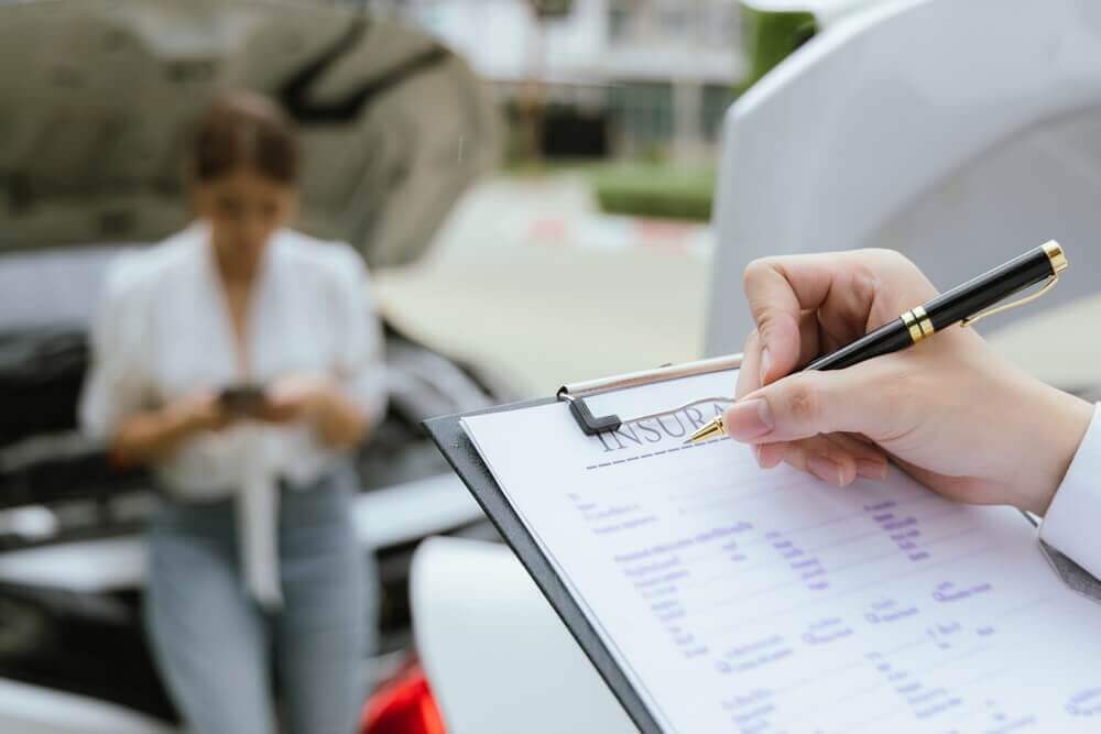 Agent checking insurance for coverage.